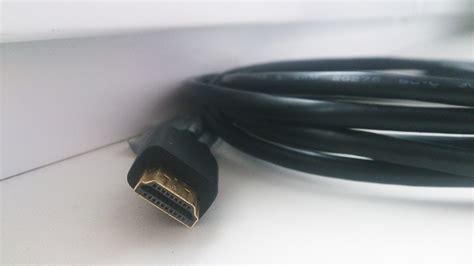 Подсоедините HDMI кабель к разъемам тюльпанов