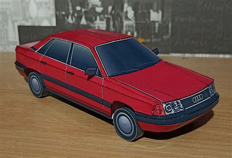 Этапы изготовления Audi 100 из бумаги: